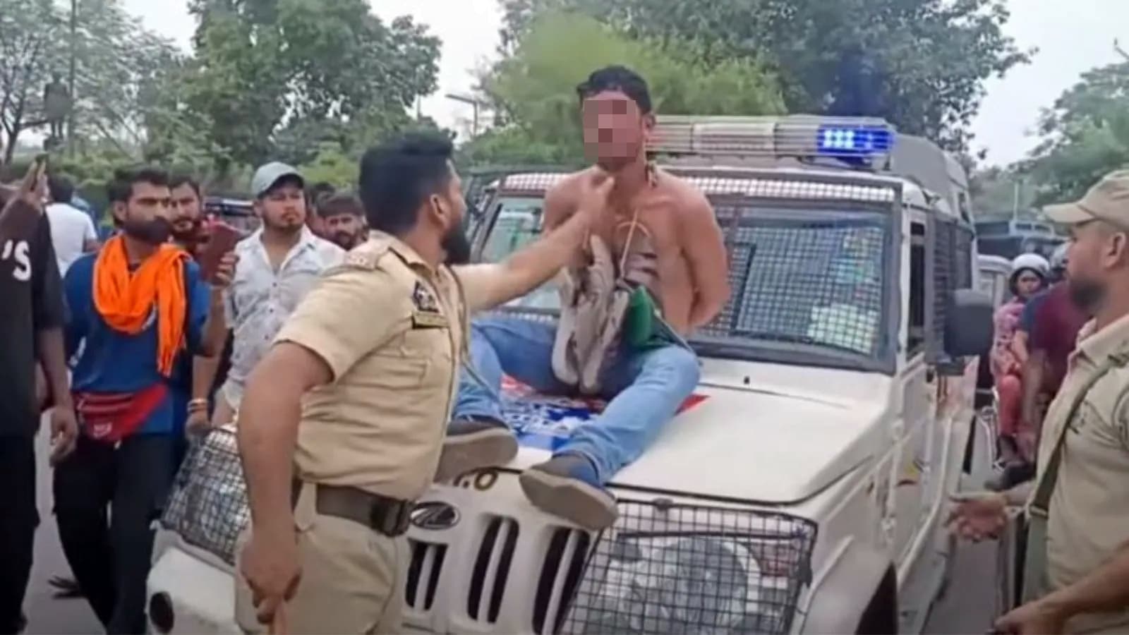 The Kashmiri man accused the Jammu police vehicle of stealing the parade shirtless with hands tied. Bharat News