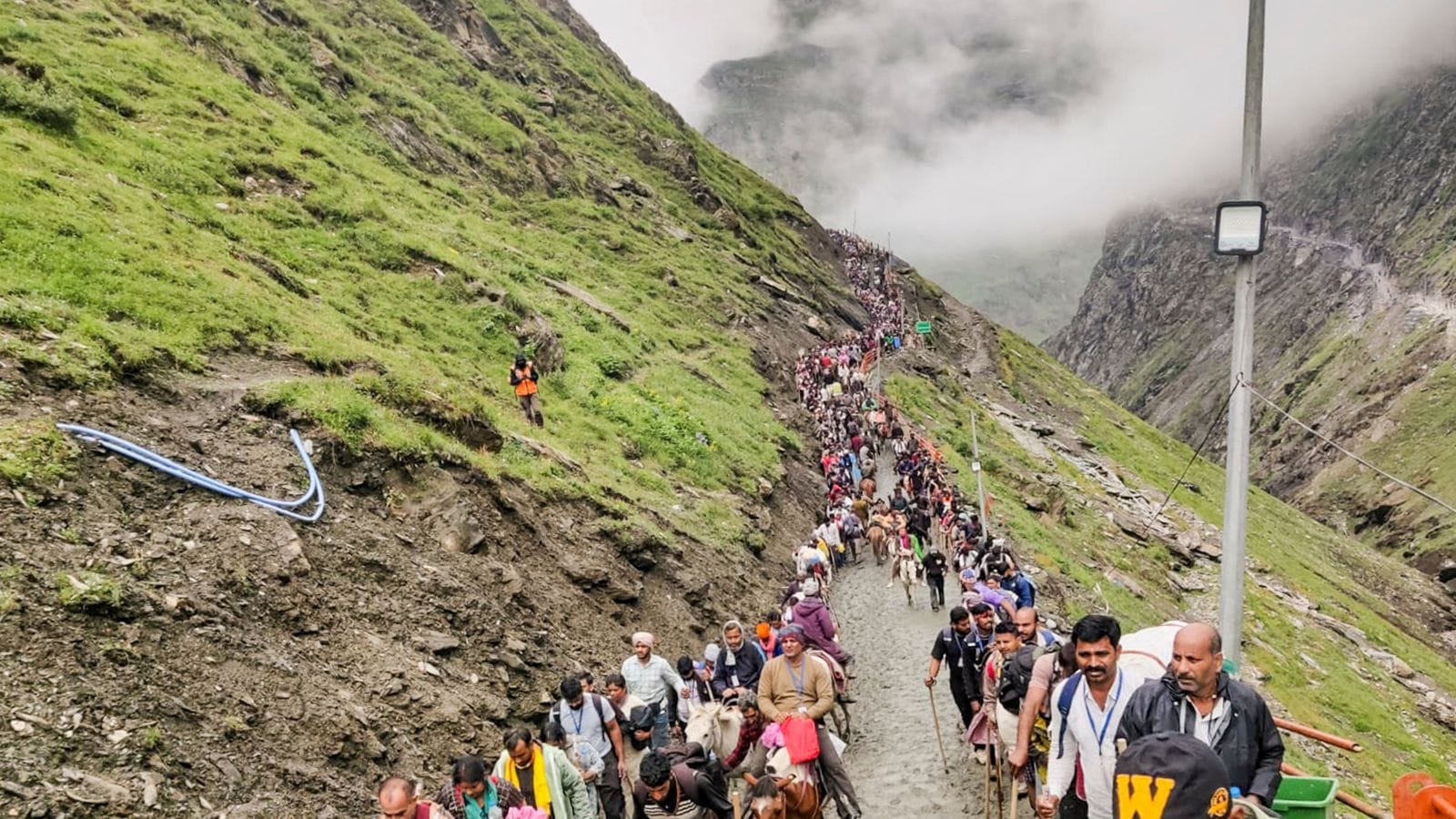 The Amarnath Yatra resumes after a day -long suspension, amidst heavy rains, landslides. Bharat News
